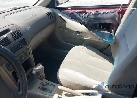 2001 Toyota Corolla Ce from USA, damaged, VIN 1NXBR12E61Z554291